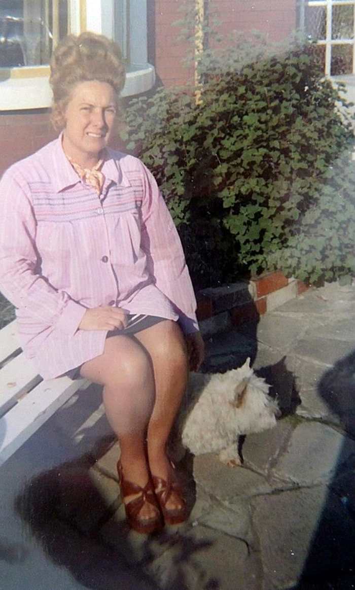 Mum in the 1970s (pictured with my dog, Mitzie, in the front garden. Mum worked in the office of a rock factory and had a gravity-defying hairstyle and wore the platform shoes of the era.