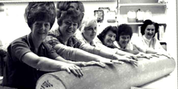 Rock rollers at Ashton Candy Co in the 1970s, when mum worked there, pictured with the official Biggest Stick of Rock in the World, which they made. Mum was friends with Yvonne (second left).