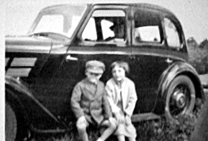 My mum Aud and her little brother Ken (sitting on their grandad's car, with their grandma in the back seat) in the 1930s