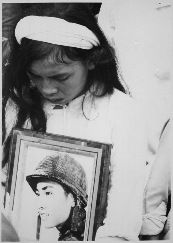 Mourning the travesty of war. Photographer unknown. (U.S. National Archives and Records Administration)