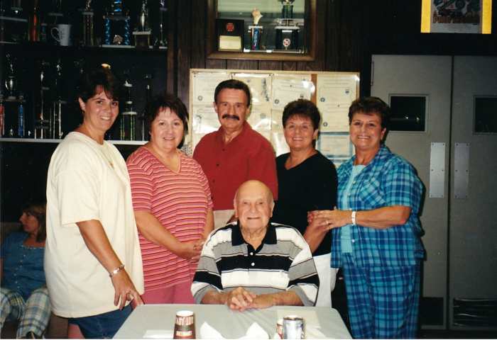 Left to right: my sister, Christine, me, my brother, my sisters, Joyce and Marian. My father sitting down. My mother had passed away by this time.