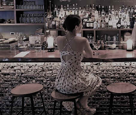 She stayed a while longer to finish her drink. Then, she paid her tab and left the scene, feeling emptier than when she had entered.