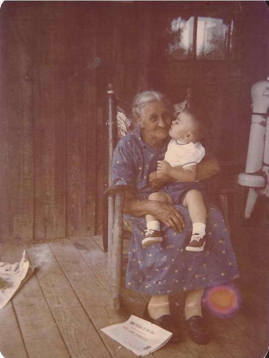 Great granny and grandson enjoying those special moments on a front porch somewhere in Tennessee.