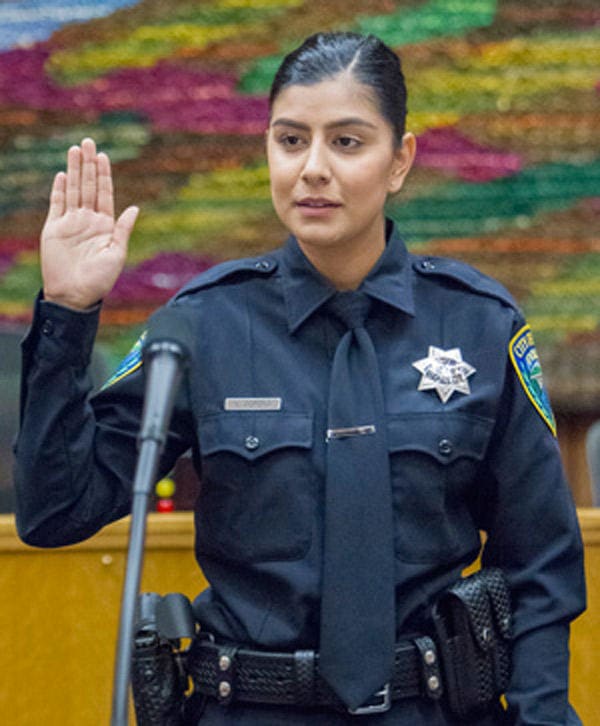 Officer Natalie Corona a beat police officer. I publish this photo and the one at the top in memory of my good friend, "Bud."