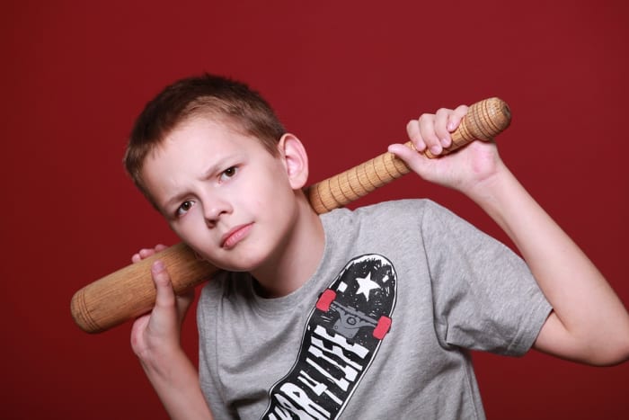 This photo should give you an idea on how Tommy looked--but he didn't carry a club.