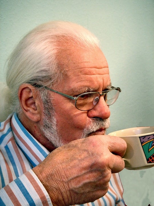 This man is at peace with his life, job, family, home and coffee.