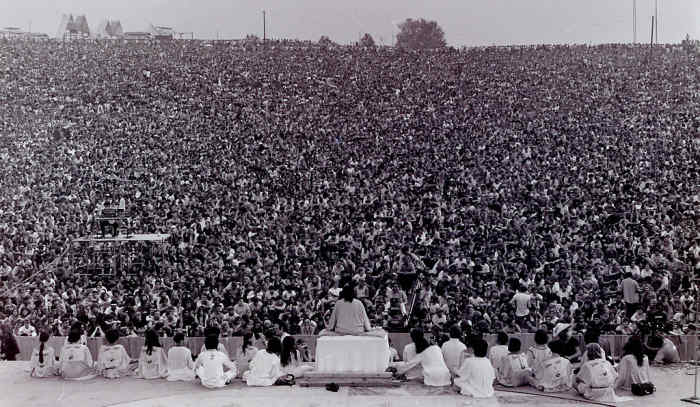 Opening ceremony at Woodstock. Swami Satchidananda speaking.
