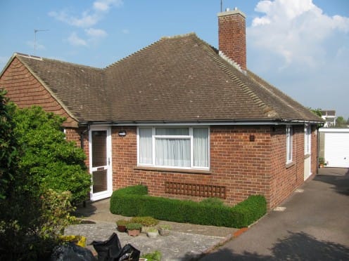 Our house (bungalow). Back door is on the right of the house, just before the garage