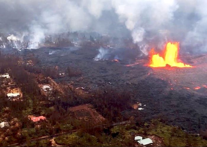 Lava from an erupting fissure covers the neighborhood of Leilani Estates. (Photo courtesy of USGS-HVO)