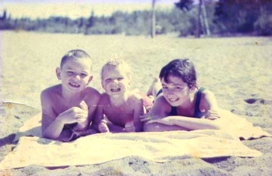 My little brothers and I the next summer, 1962, looking like 'normal happy kids'. SunnysideBeach, Emma Lake Saskatchewan