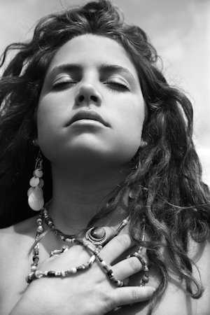 Renee is definitely not herself as she clings to the cause of her problem. It is nestled among the other necklaces.