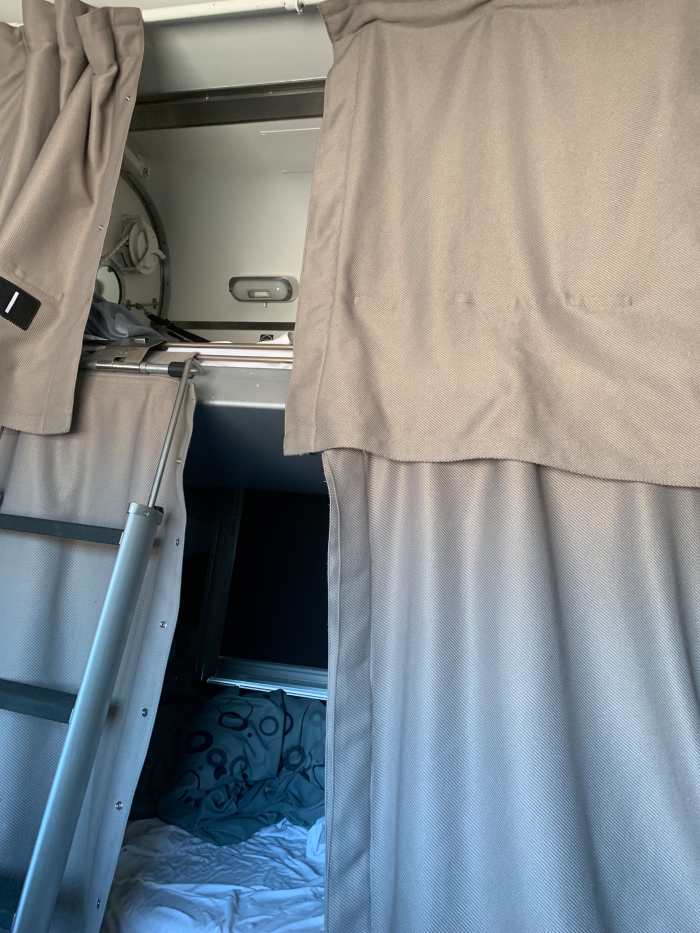 In the evening, while passengers are eating in the dining car, the seats are converted by train employees to bunk bed style sleeper berths
