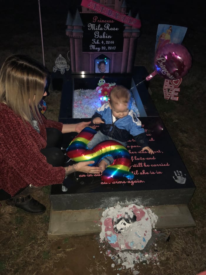 Our daughter’s 5th birthday celebration. This is me and her little brother-our rainbow baby-at her resting place.