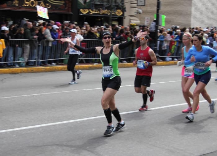 This is me about to cross the finish line, so excited and feeling sassy...little did I know that in 10 minutes, that was all about to change.