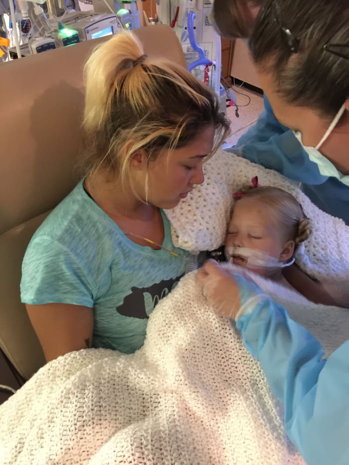 I waited outside for her brain scan to be over and all I could think was that she needed her mommy to hold her. I can’t begin to explain it, but when they placed her in my arms I felt peace for the first time in days and I know she did too.