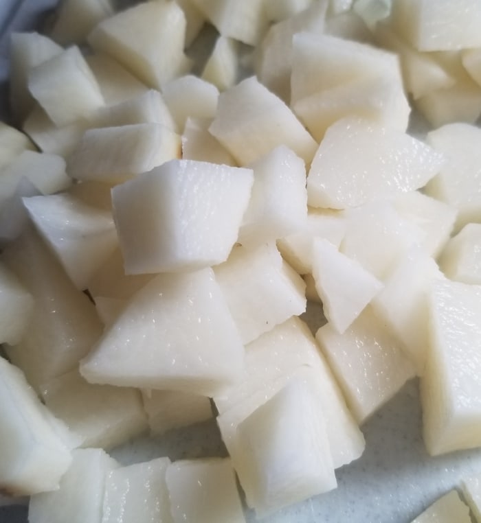 Peel and dice the potatoes, so they are ready to go in the broth immediately. They take longer to cook than the other ingredients.