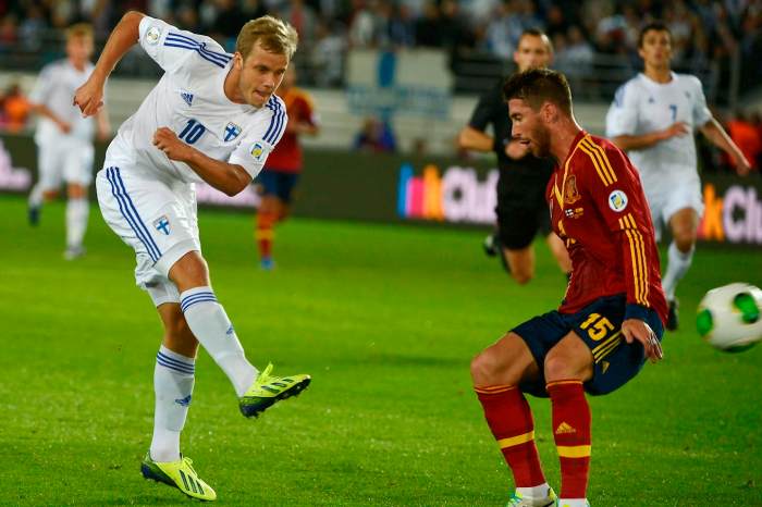 Teemu Pukki (#10) of Finland attempts a shot against Spain in a 2014 FIFA World Cup qualifier on Mar. 23, 2013. Pukki's tying goal earned Finland an historic 1-1 draw in Gijon, Spain.