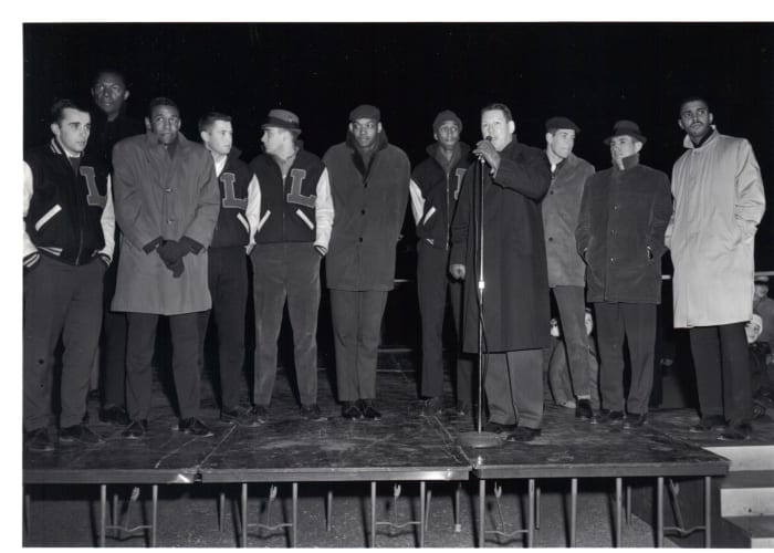 Coach George Ireland addresses the students from a stage on Pow Wow Weekend on the eve of the opening of the 1962-63 season.