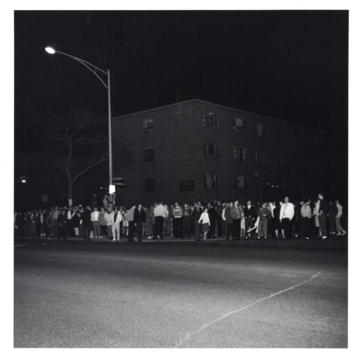 Students line Sheridan Road celebrating Loyola's National Basketball Championship on March 23, 1963.