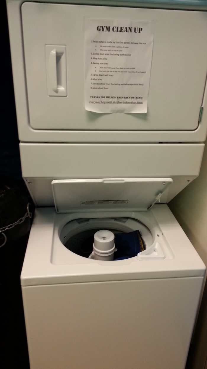 A washer and dryer are fantastic disinfectants for gis, towels, and other equipment.