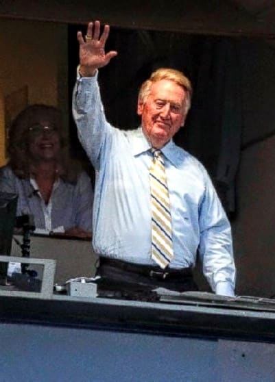 A kid excited because an announcer acknowledged him? You bet! He was that popular. "Dad! Vin Scully just waved at me!"