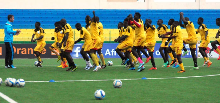 Ugandan players participate in training ahead of the 2016 African Nations Championship in Umuganda Stadium in Giseyi, Rwanda on January 17, 2016