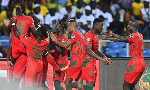 Guinea-Bissau players celebrate during the opening game of the 2017 Africa Cup of Nations in Libreville, Gabon on Jan. 14, 2017.. Juary Soares scored one minute into stoppage time as Guinea-Bissau earned a shocking 1-1 draw.