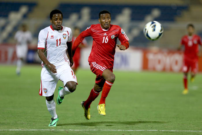 Mohamad Al-Boqsan (#10) chases for a ball with United Arab Emirates during the 2013 AFC U-22 Championship group stage match on Jan. 13, 2014 in Muscat, Oman. Boqsan would go on to be one of 23 players on Yemen's Asian Cup squad.