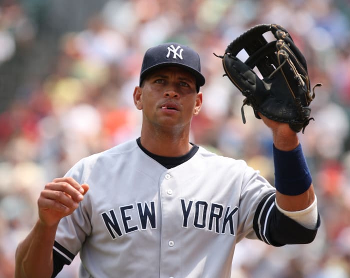 Alex Rodriguez, seen with the New York Yankees in 2007, is credited with being the first player to sign a mega-contract. He inked a deal for 10 years and $252 million with the Texas Rangers, then opted out to sign with the Yankees for $300 million.