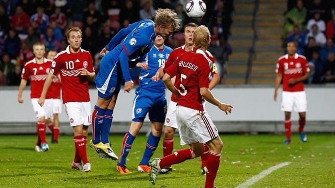 Iceland's Birkir Bjarnason heads in a goal during Iceland's 2011 UEFA U-21 Championship match against Denmark in Aalborg. Birkir became Iceland's first goalscorer at a major tournament when he scored against Portugal at Euro 2016.