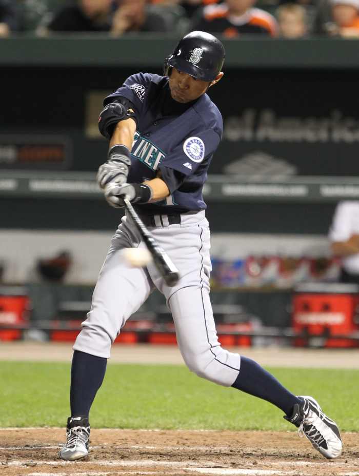 Former Seattle Mariners outfielder Ichiro Suzuki makes contact during a game in 2011.