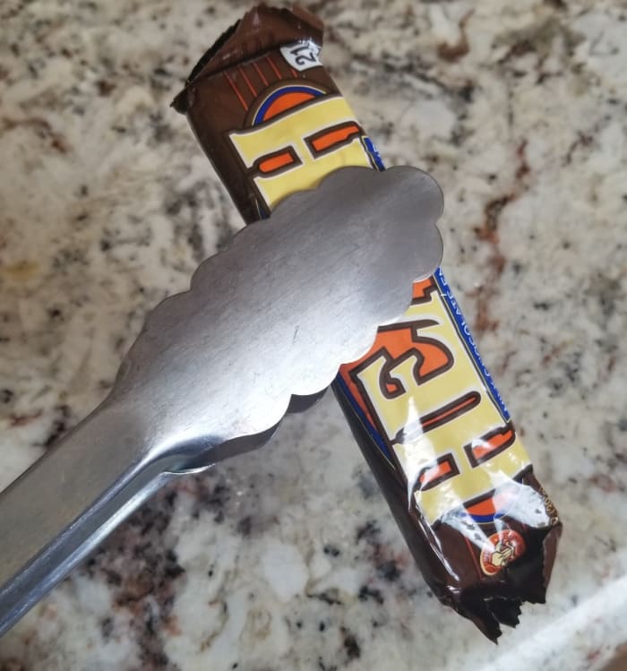 Give your child tongs so they do not have to stick their hands in candy bowls that half the neighbors have touched.