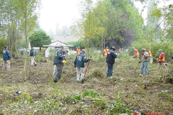 FBI investigators search McCleary where Lindsey Baum went missing June 26, 2009 in Washington. Photo courtesy of the FBI.