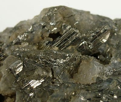 Calaverite Locality: Cripple Creek, Cripple Creek District, Teller County, Colorado, USA (Locality at mindat.org) Size: 6 x 5 x 3.5 cm. Calaverite is a very rare crystallized gold telluride species, found in good crystals over 1mm in few locations.