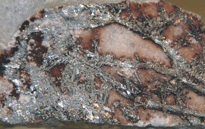The Cripple Creek Gold District of central Colorado, USA is famous for its unusual gold and silver mineralization. Precious metal mineralization occurs in the Cripple Creek Diatreme, the root zone of a deeply eroded volcano dating to Early Oligocene
