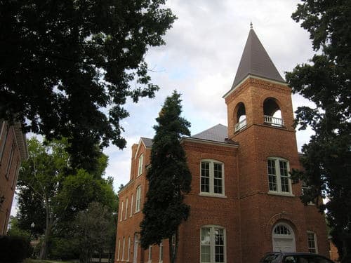 Photo Of The Newberry College. The Bell Tower is said to be haunted by a young lady from the Civil War Era who jumped to her death when she heard of her boy friend being killed in the Civil War. She is seen often up in the Bell Tower.