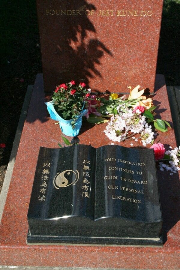 Bruce Lee Grave. Many people have reported seeing him setting on the bench in front of his grave. He is also seen other places.
