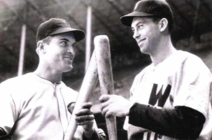 Jeff Heath of the Cleveland Indians (left) poses with Cecil Travis before a game on May 5, 1941. His ghost is often seen still watching the game