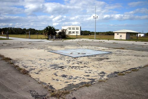 Discarded Dreams of Camelot: Cape Canaveral, Pad B - Represents the loss of key people and an important Era, including the US Space Program, which was John F. Kennedy's dream.