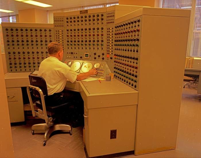 Seattle City Light staff at the analog Enns Power Network Computer, 1968. Glorified typewriter?