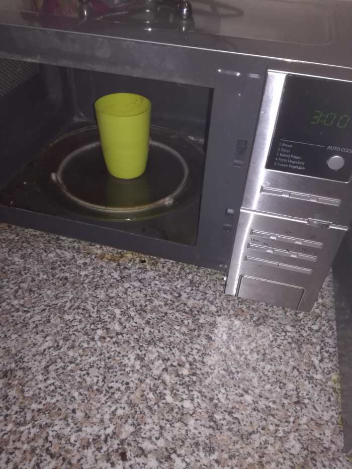 Vinegar, lemon juice and water microwave for 3 minutes and voila a stain free microwave friendly cup.
