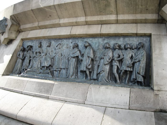 Columbus meeting with King Ferdinand and Queen Isabella in Cordoba, Spain. Bronze sculpture at base of Columbus Monument, Barcelona, Spain