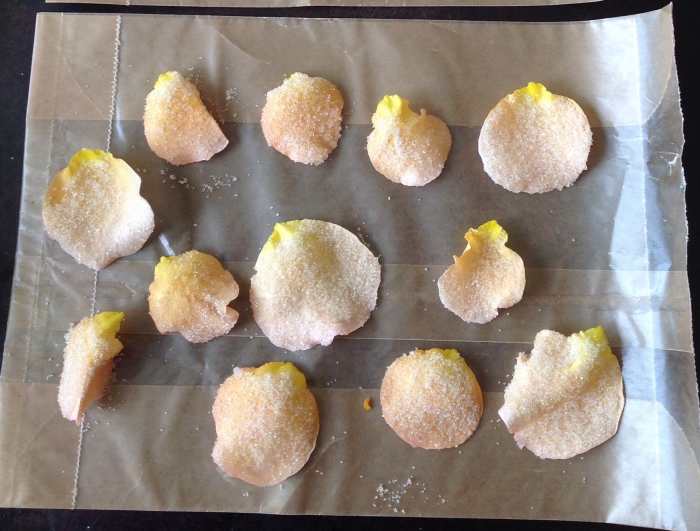My roses bloom at this time of year, so I like to make crystallized rose petals. Some are given as treats for the holiday, and some get stored in the freezer for later in the year.