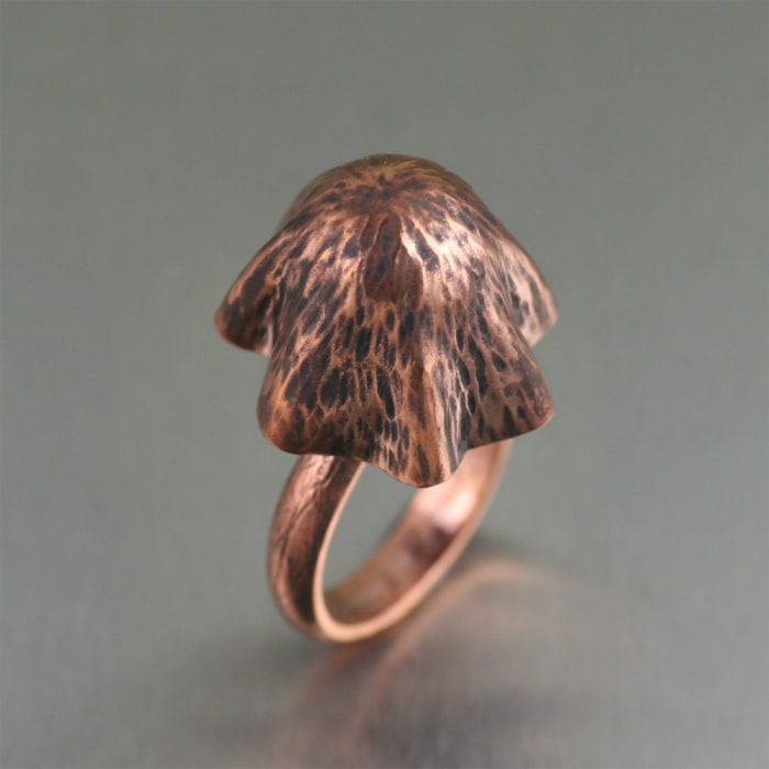 Richly enchanting, this handmade copper mushroom ring showcases a large, Liberty Cap mushroom that is guaranteed to make some magic.
