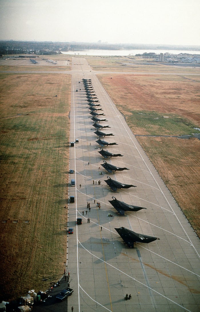 22 F117 Nighthawk Stealth fighters lined up and ready for deployment in the first Gulf War over 42 were sent to Saudi Arabia.