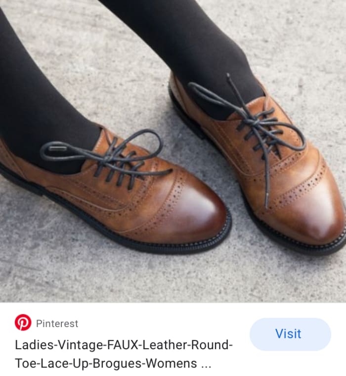 Brogues like these could easily work for men. There are others such as Oxford's or work shoes like this suited to men.