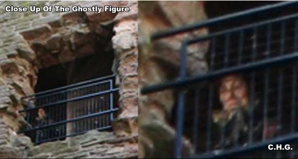 Close up of the ghostly figure looking out the gate. Notice his middle ages collar.And his face is very clear.