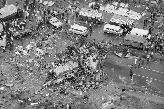 Aerial view shows wreckage, rescue vehicles and shroud-covered bodies of victims of ill-fated Eastern Airlines' Boeing 727 which crashed during an apparently normal landing approach to the airport