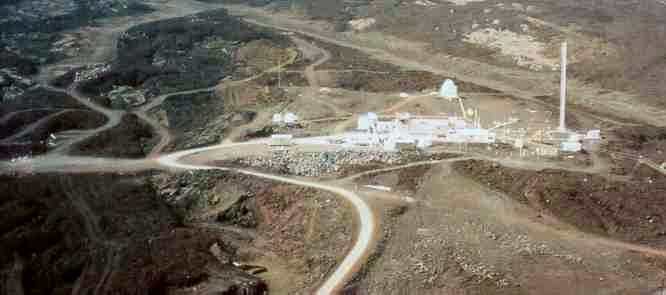 Aerial view of Mauna Loa Observatory. The high-altitude, isolated location was chosen to facilitate the measurement of "background" CO2 levels. Image courtesy Wikipedia.