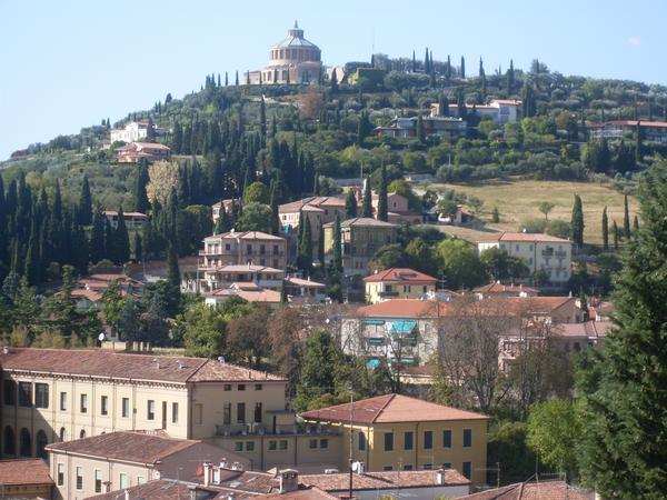 Picturesque hill with Cypress trees overlooking the city